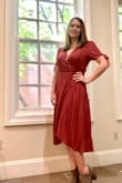 I love this dress! It's very comfortable and fits true to size. The fabric is very light, so you can wear it from summer to winter by only adding in a sweater or jean jacket. I got soooo many compliments on it. This is one of my new Fall staples! - Katie G.