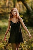 Wore this dress for my senior photos before graduating and it happened to be around sunset... The way the dress shimmers when it hits the light is what makes the dress so unique! I absolutely love how the dress falls and is so dainty. Definitely recommend - Barbara