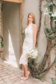 This dress was gorgeous! So chic and classy! I got tons of compliments on my wedding day. - Christy L.