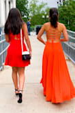 I absolutely love this dress. I ordered it for a wedding in June and it was stunning. The color is just as vibrant in person, and the material is soft and comfortable against your skin. I did have to get it hemmed even with 4 inch heels, so if you are shorter just consider the additional cost. It is also a bit tricky to get on by yourself, but manageable. All in all this dress is gorgeous and definitely one of my favorites that own. - Anabela P.
