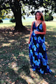 Beautiful dress! I got so many compliments at a wedding I attended. Flowy and romantic! A medium was the perfect fit for me. The length was great- I didn't have to wear heels and I didn't trip over it! The neckline was low, but the cut showed zero cleavage. All in all, my new favorite dress! - Ashley P.