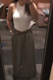 I wanted to love this so much - it's perfect on the model pictured. It's not terrible - I still wore it to work and got compliments - but it felt like a giant potato sack. It's heavy. I think it definitely looked better than it felt. And the waist on the XS fit perfectly. But I wore heels and it still touched the floor, so I'd bunch it up to go up and down stairs, but the button by my crotch kind of popped open every time. Not practical, but very boho chic. Would look great on someone not 5'2 maybe. Also wrinkles easily, but irons easily too. - Sofia S.