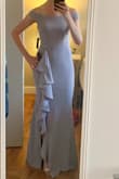 This dress is gorgeous! Sexy but stays classy. It is long, which is great for me- I'm 5'8 and can wear 3.5 heels with it. May need to be hemmed if you're on the shorter side. The material is high quality and it fits smoothly. I have a smaller bust and larger backside, but since a mermaid skirt is always going to be tight I sized down so that it fits better in the chest. Can't wait to wear this out! - Lauren I.