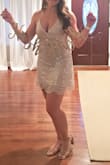 I loved this dress for my bachelorette party! I had worn so many white dresses so I loved that it was sparkly silver and nude. It was fitted in the waist but not too tight, fit like a glove! - Taylor E.