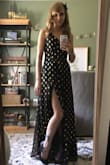 To be fair, I'm normally an XS but I loved this dress so much I ordered a S since they were sold out of my size. I knew I'd need to get it tailored but when I put it on it was absolutely massive. I needed it taken in on both sides, hemmed, and the chest was really low. Also, the slit runs so high that I could literally open it up an expose everything underneath (all you need is a gust of wind or a killer dance move to show everyone what you've got going on!). The dress itself is stunning and I can't wait to get it back from the tailor. - Jennifer B.