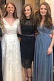 I wore this dress to my sister's wedding and loved it! The slate blue color and the detail at the top are both beautiful. The top area also fits really nicely and the adjustable straps were perfect. I don't have the wedding pics yet but shared what I could for reference!

The only two things to note: 
- It is extremely long. I am pretty short so I knew I'd have to get it hemmed either way but this dress was very long. I'm 5'1" and probably got over 6" taken off and thats with wearing 5" heels. So the dress was probably about a foot too long for me.
-The material pulls easily. The bottom material of the dress pulls and rips very easily so handle with care. I accidentally ripped my dress at one of the seams but the tailor fixed it easily thankfully. - Erica C.