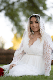 I got my dress super quick. I've never been a girl to dream of a big poofy dress on her wedding day. I was skeptical about ordering my dress online without even trying it on, but I couldn't find anything simple and beautiful like I wanted which this dress seemed to have. Once I received my dress, I instantly fell in love. I had to do a little fixing to make it fit perfect but I could it have imagined wearing anything else. There are no regrets and I am so happy with my decision. My husband was in love with the dress and the price! - Ariana C.