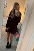 I spent a long time debating on whether to get a xs or s. I ended up going with a small and I am pretty content with it. The arms are a little loose but I feared that if I got an xs it sweater would be too short to wear as a dress. This was a good call because the sweater dress comes to my finger tips as a small and I don't have a long torso at all. If you are conflicted on what size to get, I'd go a size up. Thanks Lulus! - Janine A.