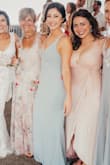 The dress fit PERFECTLY! I wore it with 2 inch heels and it hovered just right above the floor. I didn't wear a bra with it and was concerned about it at first but had no issues and never had any "slip" ups. I was comfortable dancing, and partying the night away and got compliments all evening. - Kelly T.