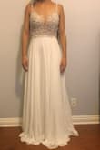 I love this dress. I knew when it looked good on every single woman in the reviews that it had to be something special. I love backless dresses and the bodice has very pretty beading for such an inexpensive wedding dress. I had been worried the pads would look like floating boobs but they blend in well. I looked in other wedding stores and online but this was the best I saw, even compared to $1000+ dresses. I need to get the bottom hemmed and possibly shorter straps for a better fit but I'm so happy with this dress! - Hope