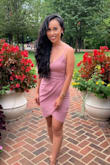 I adore this dress! I wore it for my friend's wedding this summer and received compliments. The color is perfect for spring or summer. I ordered it in XS and do think it runs on the tighter end, but I didn't mind. I wouldn't recommend this dress if you're trying to dance and get low on the floor (you can only go so far ;) because the dress rides up). Other than that, I still give it five stars because it's cute! It definitely hugs your body in the right places. - Rose A.