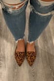 These slides are so cute!! I love the leopard print and it's not too crazy looking. I got a size 8 and the length fits me PERFECTLY, but it is a little loose where the toes are, feels wide. But it isn't a problem when walking and I wouldn't size down either. I do agree with everyone on how the foot part creases so fast. but these are such a staple for fall! I love them! - JENNY Y.