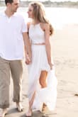 I wore this dress for my engagement photos and got soooo many compliments!! The fit was perfect. I'm not one who usually wears crop tops or anything that shows my stomach, but this was still very modest and didn't show too much. - Allison F.