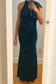 -Design and quality are excellent. I'm a S in all Lulus dresses & a S was again perfect fitting. (Yay consistent sizing!) -Color is slightly darker in real life (in teal). - So extremely comfortable, which blows my mind because it's structured, but doesn't feel that way. Better than average material. - If you're 5'10" or taller: The design intent is to graze the floor. It's not long enough to do that on me & wearing more than ballet flats would make the whole thing unflattering on me. It fits so well & it's extremely difficult for me to find floor length dresses that aren't high-waters, that I'm choosing to overlook the *slightly* too short hem length...but I imagine I'll be tugging it down whenever I stand up. - Stephanie A.