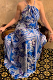 This dress is a head-turner! It's veeeery thin but because of the print it is not see-through. It was too long even on my 5'10" plus a 2" heel. The dress creates a small "pocket" on the back, but this is such a minor issue comparing to the overall effect. A strapless bra works well - just make sure the color is right, because the bra will be visible in the "pocket" on the back. - Alexandra I.