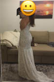 I really like the dress and I probably wear it for my wedding. The delivery to Switzerland was very quickly. It fits quite well and I was surprised by the nice quality. It is just way too long for me :) but that's always the case for me because I'm very short. So the only thing I will get altered is the length of it. The rest is fine. - Anja W.