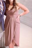 I loved this dress and got so many compliments. I ordered a medium. It was perfect for my small rib cage & curvy bottom half. It hugged just right then flaired out. I had to buy some short like undergarments bc the fabric is thin, but that wasn't a big deal. Loved it! - Rachel H.