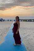The dress fit perfectly!  The hem was uneven, but I had to hem it a bit anyway.  I wore this to wedding and got several compliments.  Loved the color. It fit snugly enough on top that I didn't need a bra with it but wasn't uncomfortable.  Very pleased with this purchase! - Lori L.