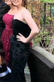 I wore this to homecoming and got a lot of compliments. I have a smaller chest so I was nervous this wouldn't fit but with a little bit of double sided clothing tape this fit perfectly - Abby P.