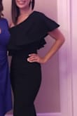 The dress fit perfectly. No need to wear a bra. The dress was snug across my chest even as I danced all night. I've already worn it to 2 weddings and a quinceanera. - Kymberly A.