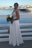 I ordered this dress for our simple wedding and I instantly loved it. I did alter it to fit exactly right but I also ordered a size bigger then I usually would. I received so many compliments and I felt absolutely beautiful in this dress. - Holly S.