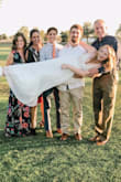 I am not one to order dresses online, especially for a special occasion, but seeing the reviews with pictures from those who actually purchased it made me very confident in ordering from Lulus! I have been working hard to lose weight for my wedding reception so I ordered a medium very unsure about how it would fit as the day arrived. I absolutely adore the dress, I felt very comfortable in it! The only bothersome part is that the bottom of the waist kept rolling up I'm sure because of the size being slightly too small for me. It suggested a medium for a 29 inch waist and mine is 30. I would rather have had it a little tighter than loose. As others have stated, I can confirm that the dress runs rather long as well. Overall the dress is simple, elegant, and great quality! - Morgan D.
