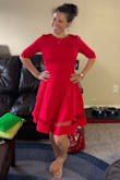 The color is beautiful and the fit is pretty right on. I didn't love the fabric - it was quite thick, which is fine since this is likely a fall/winter dress, but it was very wrinkly and kind of stiff. It wasn't uncomfortable, just not my favorite fabric for a dressy dress. I ended up returning the dress because I just didn't love it for the price and didn't feel fabulous in it. - Janelle S.