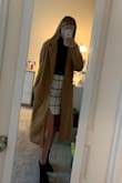 Some of the comments say it runs a little big, but honestly, that's a good thing. This coat is perfect for the winter time and saves some room for large sweaters underneath it. I can wear my thickest sweater and not feel constricted by this jacket. The sleeves are a little long but can be rolled under and you can't tell the difference. Great buy for a great price. Thank you Lulus! - Janine A.