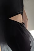 I was so excited to wear this to my sister-in-laws wedding! I ordered a small. It fits quite well up top (maybe a little tight in the arms) but the open back is super loose! The band around the waist is a bit itchy. The fabric wrinkles really easily. Will be returning, unfortunately. - Sarah B.