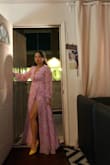 I absolutely loved this dress so much. I wore it to a classy Persian wedding in a museum. I think it's conservative enough with the sleeves, yet still very romantic and beautiful with the float fabric, flowers and buttons. It also has a daring side with the leg slit!! - Margie C.