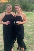 I wore this as a bridesmaid. It was very flattering on me and the other bridesmaid and I got a lot of compliments. It was really long, so good for tall people. Being 5'2 I had to have it hemmed about 6 inches off and it cost me $80 (I live in Hawaii) It cost the other bridesmaid $200 to have it hemmed (in DC area)!  I was comfortable and might wear it again or sell it but the cost to hem it made us wish we had chosen a different dress. (Ps we have our dresses tied up in the photo because there were burrs all over the ground) - Liz H.