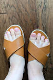 I'm usually between a 7-7.5 and I ordered an 8. I also have wide feet and I think it's made for a more narrow foot but overall super cute and good to wear but not for long with my wide feet! - Dana M.