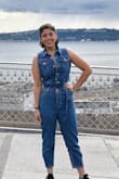 I was so excited about this jumpsuit! I was slightly nervous because of the sizing issues others have pointed out, if you have a smaller frame and size down it should be fine. If you have a curvier frame, like myself, buying your own size is perfectly fine! But I couldn't be happier with this look and the compliments I get about it. I leave about two buttons unbuttoned at the top or I feel like the mechanic from Dukes of Hazard, but it's worth it! 100% would recommend. - Catherine T.
