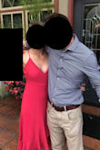 I wore this to a semi-formal wedding and loved it. I'm self conscious of my tummy area and this was not snug so it fell nicely on my body. The only things I didn't like about it was that the fabric around the chest was too loose, and that when you sit down the dress slides open so you have to tuck it closed. Still absolutely loved it and got a lot of compliments! - Gina M.