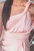 I brought the dress for my sisters wedding. It was versatile for all the bridesmaids to style according to our weight and style. Comfortable material to wear all day. - Kiendra M.