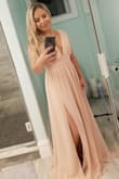 This dress fit me like a dream. The waist band sits right around your natural waist so it is very flattering. I did initially order a medium, but I wanted the waist to be tighter, so I exchanged it for a small and it fit much better! I did have to use fashion tape because I have a small chest and didn't need to show off anything while leaning over. The length was way too long for me, even though I got a size Small, but I am pretty short so, almost everything I buy has to be hemmed. It was very comfortable and lightweight. Perfect for my sisters beach wedding! - Katherine L.