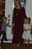 This dress was perfect for the holidays. The slit is not too high so it's elegantly cut! - Cali W.