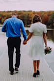 I loved my dress. We eloped, lakeside by our home. Didn't want anything fancy, not my style anyway. This dress was flattering and I felt great in it. You will need a slip or nude stockings, the skirt is on the sheer side. The top was low cut, but since it was just my husband and I, I didn't mind. Dress steamed easily and maintained wrinkle free appearance throughout photos. Would get again in different color to wear on a date night!! - Patti P.