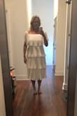 Love this dress. So comfortable and flattering. It does run large. I am too heavy and still ordered a size down. Works both off and on the shoulders. Picture doesn't do it justice. - Becky M.