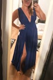 This is the second colour I own of this dress. It is absolutely stunning! I'm usually a large but beware, the waist is very tight and not forgiving. The zipper is a bit of a challenge. I decided to size up to ensure the waist was looser as I'm wearing this to a wedding and I want that extra space for food and booze! The royal blue is absolutely GORGEOUS, pictures don't do it justice. It photographs as a different kind of blue when in natural light vs inside with flash and I can't get enough. I used sticky cups and double sided tape to keep myself in place and it worked just fine. - Em K.