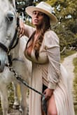 This dress is amazing! As it is a wrap style dress, you can tailor it to fit perfectly. The button details on the sleeve are so cute and the material is soft and breathable. I'm tempted to get one in every colour. - Alexandra D.