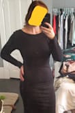 Loved this dress so much. I could have probably sized up but they were out of the XL so I went with a L. It was just a little tight but wasn't really that bad. The material is thick but stretchy, so I didn't need to wear a bra (just pasties). They only issue I had was that when I walked the dress would slide up a little in the back, which made me nervous because of the slit. But if I had gone up a size, I don't think that would have been a problem. - Caitlyn D.