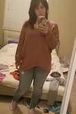 Loved the mauve color and the soft feel! I usually wear a medium or large in tops and ordered the medium which I felt made me look bigger than I am. Exchanged for the small pictures with the white jeans. If you are looking to pair with leggings go with the bigger or your usual size. - Nicole H.