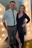 This dress is perfect! The material is so soft. The dress is comfy and sexy. I did have to use double sided tape to keep the chest area from opening too much. I wore heels with it and it was the perfect length, not too short. I got so many compliments on this dress. - Channelle S.