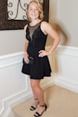 This dress fit perfectly and was great for dancing the night away! The open back was beautiful. We did purchase pasties to wear with the dress but we found them to be unnecessary. - Melissa C.