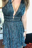 Everything fit perfectly, except where the ribcage is. I felt like a little sausage casing lol. I wouldn't size up because then I feel like the chest would be too big and the dress might be a little less form fitting. I am going to a wedding, so I think with all the eating and drinking and dancing, I would want a little bit more comfier dress. - Carly D.