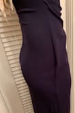 The dress is very pretty and a nice fabric. There's a little too much fabric on the sides that I have to get taken in. - Alessia I.