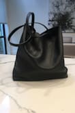 This bag exceeded my expectations. It is super roomy and the quality is gorgeous. It has a beautiful soft almost suede lining, an attached open pocked as well as the pouch that comes out!! I love this and will buy the green as well!!
(Pictures of full bag) - Stephanie M.