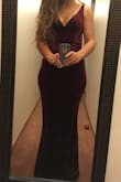I bought this as a bridesmaid dress, and I am very happy with it. The material is a great quality, and there is a slip underneath. The fit (XS) is almost perfect; I just need to shorten the straps slightly, will wear a good bra to fill out the top properly. The color is more deep red than purple. The delivery was very quick. I ordered both the XS, and S to try the sizes, and the S was really too big on top. The only disappointment was the return shipping; the website adversities free return shipping but turns out this does not apply to Canadian customers. - Rebeckah B.