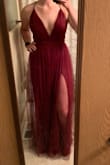 This dress is almost too long! I can wear real heals and it will still be perfect for my height, which is hard to find. The 2 slits come up a little higher than expected but the tool over the top keeps the style modest enough for my event. The dress is light weight and very comfortable but looks expensive! It makes me feel great, I can't wait to wear it to my event! - Samantha G.